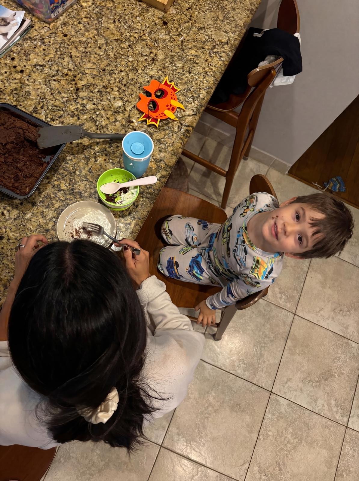 Mom and son enjoying Mamita Mae brownies together